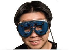 Visagraph III Student wearing Visagraph goggles to measure eye movement while reading